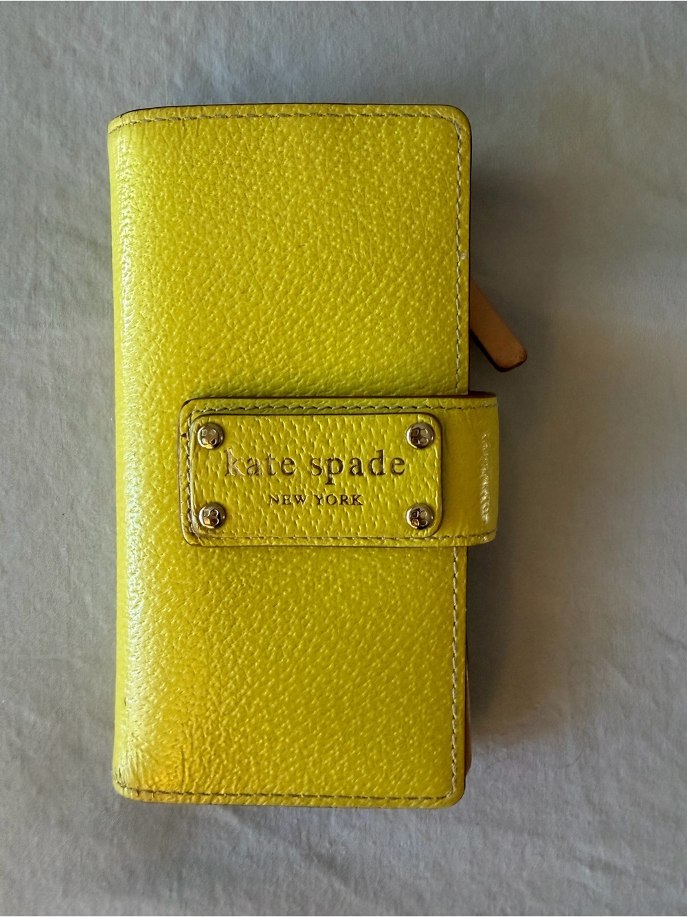 kate spade Yellow Pebbled Leather Wallet with Snap Closure